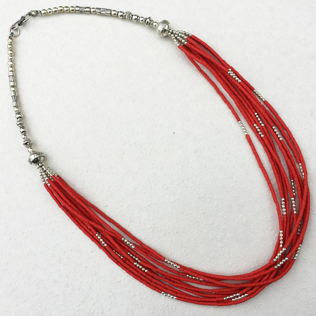 Tibetan Coral Multi Strand Handmade Necklace: Tibetan Handmade Ethnic NecklaceMain Stone: Turquoise, Coral & LapisMetal: Tibetan SilverWeight: 40 Gram ApproxSize(Inch): 18Material: StoneBrand: HandmadeStyle: BohemianEthnic Origin: TibetanCountry/
