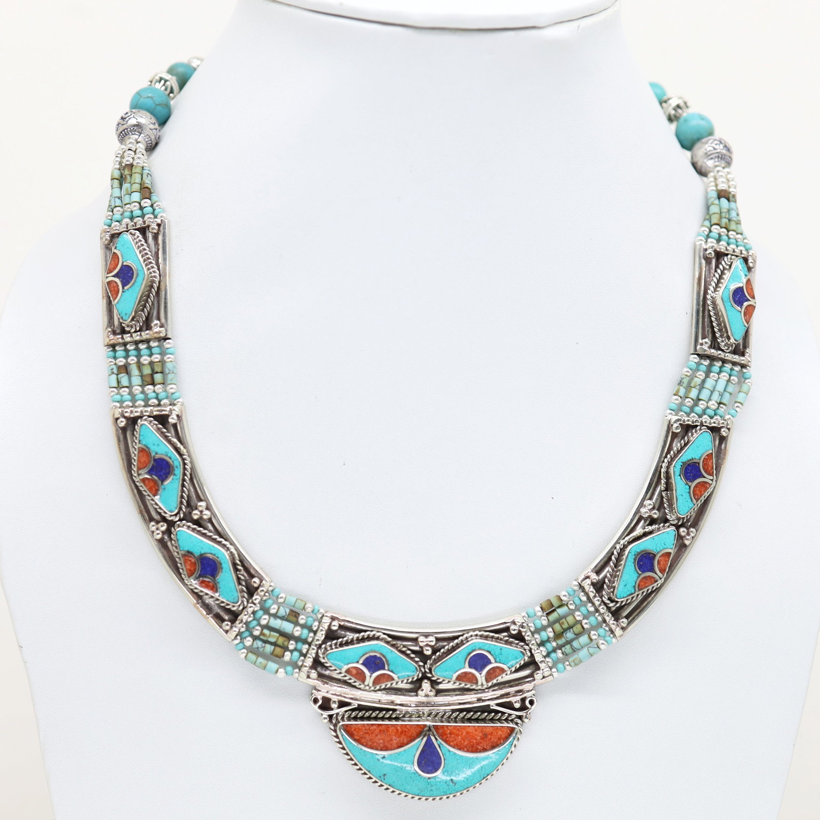 Vintage Artisan Turquoise Handmade Choker Necklace: Tibet Natural Stone Hand Made Turquoise, Coral & Lapis Necklace......This elegant Necklace was handcrafted in Tibet, the home of exquisite jewelry craftsmanship. It was skillfully made with large natu