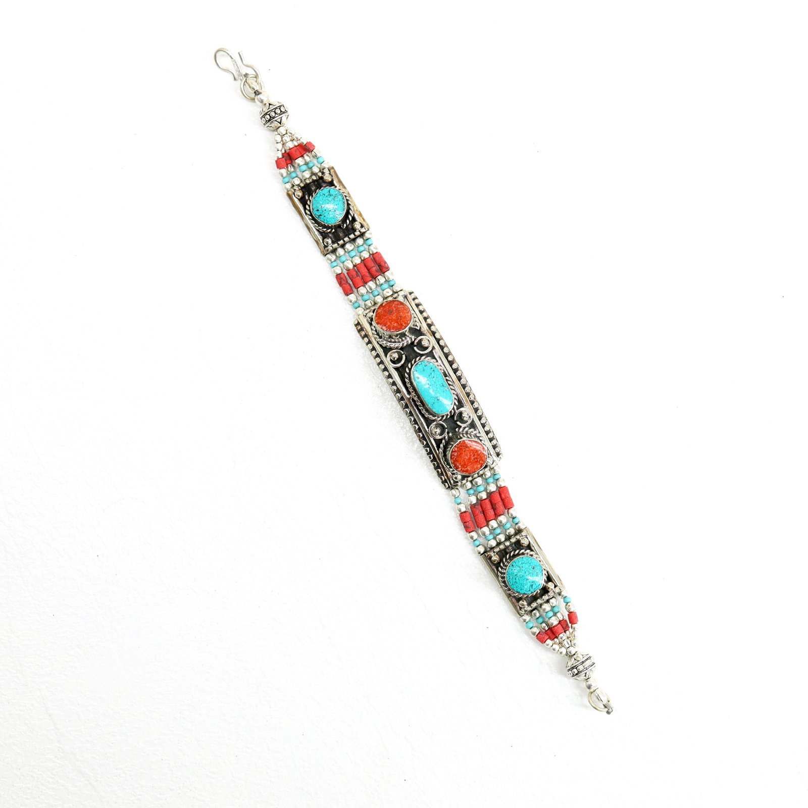 Ethnic Turquoise & Coral Handmade Choker Bracelet: TIBETAN TURQUOISE & CORAL HANDMADE BRACELETWeight: 30 Gram ApproxGemstones: Turquoise & Coral, LapisBrand: HandmadeBracelet Length: 6 to 7 InchCountry/Region of Manufacture: Kathmandu/Nepal