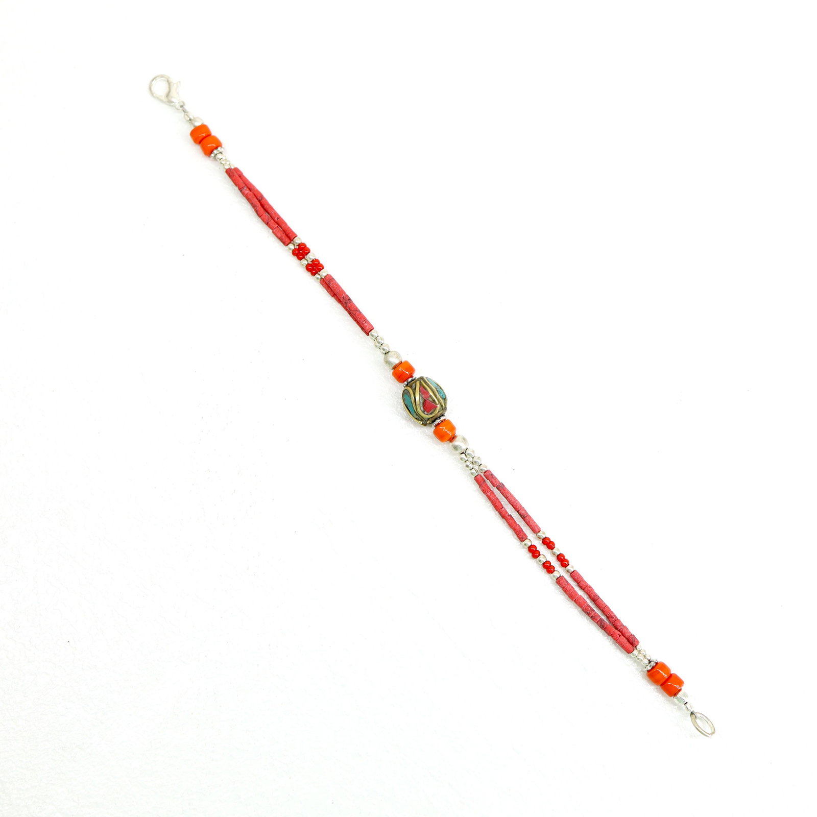 Tibetan Red Coral Handmade Beaded Bracelet: TIBETAN TURQUOISE & CORAL HANDMADE BRACELETWeight: 10 Gram ApproxGemstones: Turquoise & Coral, LapisBrand: HandmadeBracelet Length: 7 to 8 InchCountry/Region of Manufacture: Kathmandu/Nepal