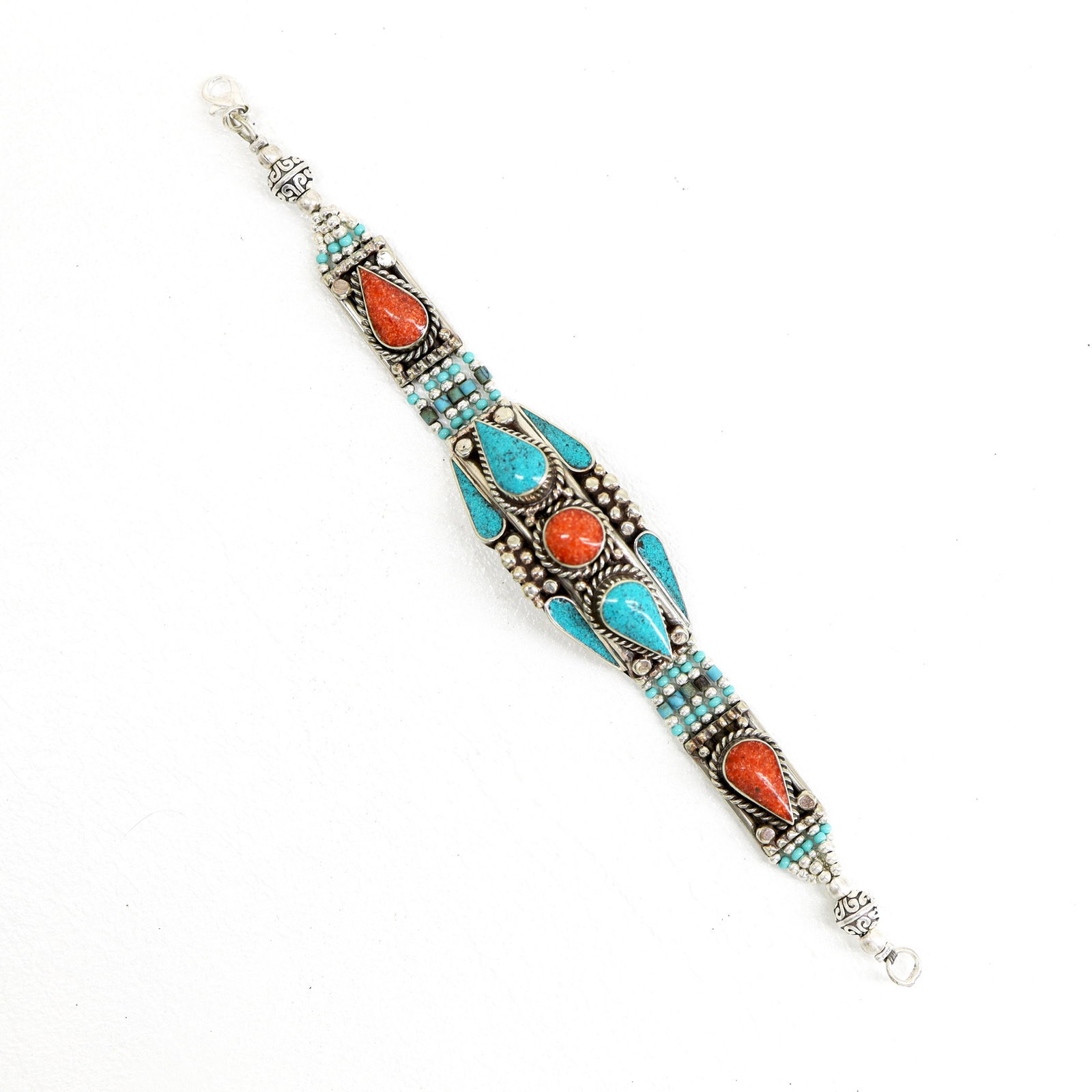 Turquoise & Coral Handmade Choker Boho Bracelet: TIBETAN TURQUOISE & CORAL HANDMADE BRACELETWeight: 30 Gram ApproxGemstones: Turquoise & Coral, LapisBrand: HandmadeBracelet Length: 6 to 7 InchCountry/Region of Manufacture: Kathmandu/Nepal