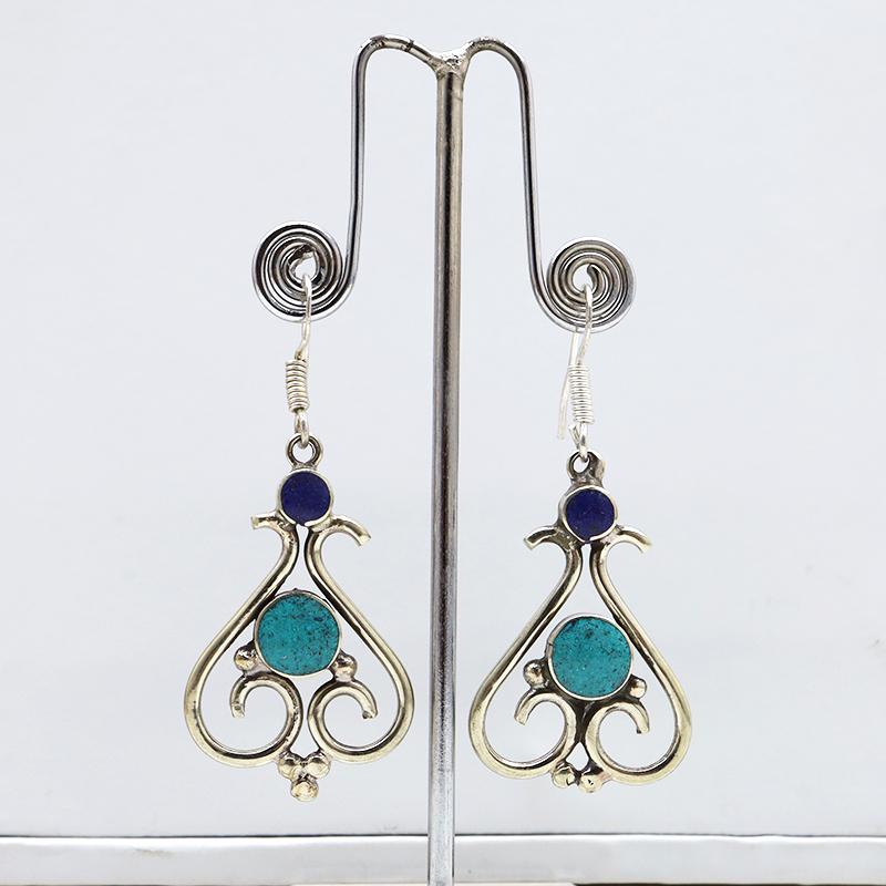 Tibetan Turquoise Handmade Ethnic Earrings: Tibetan Handmade Ethnic EarringsMain Stone: Turquoise, Coral & LapisMetal: Tibetan SilverMaterial: StoneBrand: HandmadeStyle: BohemianEthnic Origin: TibetanCountry/Region of Manufacture: Nepal