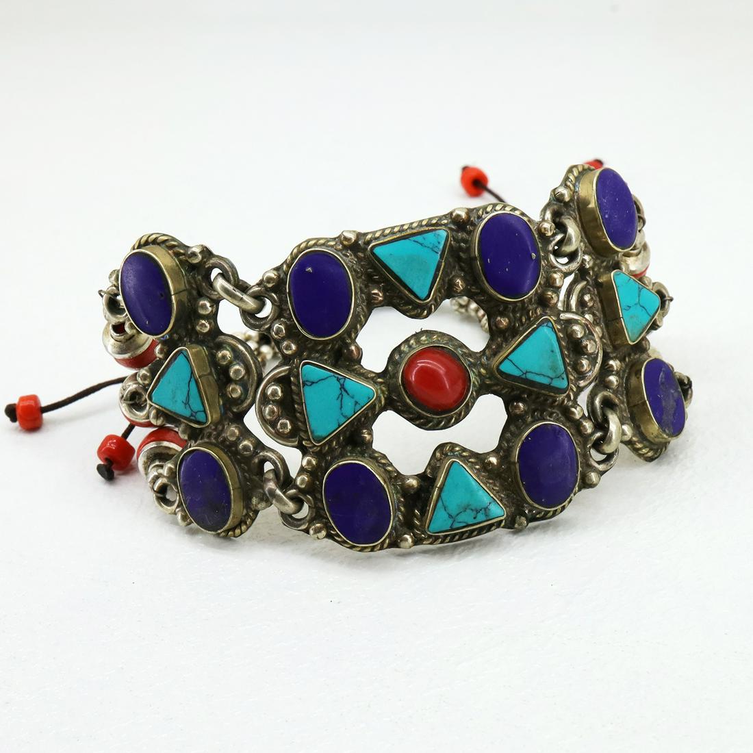 Gypsy Ethnic Choker Handmade Bracelet: TIBETAN TURQUOISE & CORAL HANDMADE BRACELETWeight: 30 Gram ApproxGemstones: Turquoise & Coral, LapisBrand: HandmadeBracelet Length: 6 to 7 InchCountry/Region of Manufacture: Kathmandu/Nepal