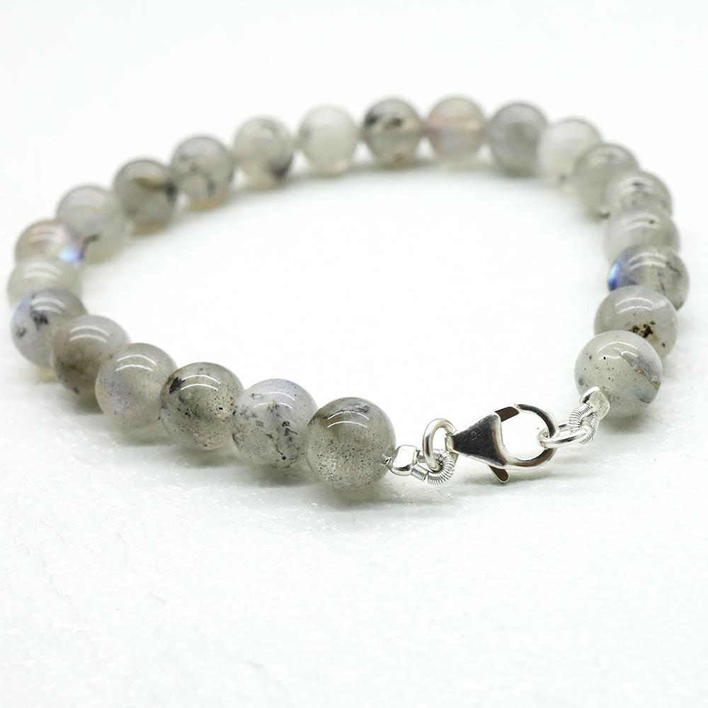 NATURAL Labradorite 8MM STERLING SILVER BRACELET: NATURAL Labradorite 8 MM STERLING SILVER BRACELET? Gemstone Name: Labradorite ? Length: 8 Inches? Color: Multi Colour? Line: 1? Shape: Plane Round? Stone Size: 8 MM? Weight: 17 Grams Approx (Including