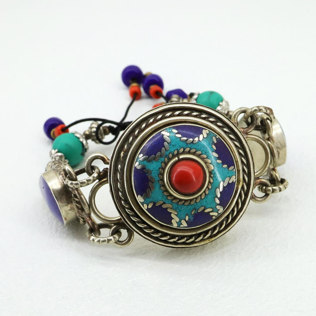 Ethnic Turquoise Choker Handmade Bracelet: TIBETAN TURQUOISE & CORAL HANDMADE BRACELETWeight: 30 Gram ApproxGemstones: Turquoise & Coral, LapisBrand: HandmadeBracelet Length: 6 to 7 InchCountry/Region of Manufacture: Kathmandu/Nepal