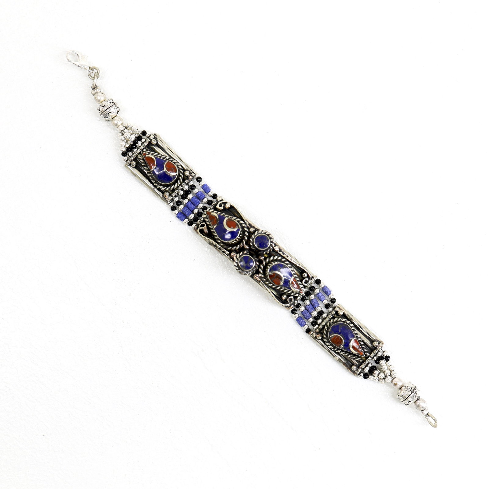 Ethnic Natural Lapis Choker Handmade Bracelet: TIBETAN TURQUOISE & CORAL HANDMADE BRACELETWeight: 30 Gram ApproxGemstones: Turquoise & Coral, LapisBrand: HandmadeBracelet Length: 6 to 7 InchCountry/Region of Manufacture: Kathmandu/Nepal
