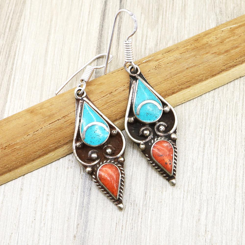 Tibetan Turquoise & Coral Handmade Chokar Earrings: Tibetan Handmade Ethnic EarringsMain Stone: LapisMetal: Tibetan SilverMaterial: StoneBrand: HandmadeStyle: BohemianEthnic Origin: TibetanCountry/Region of Manufacture: Nepal