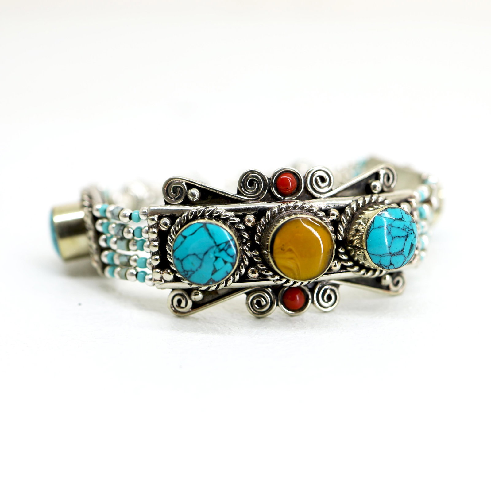 Ethnic Antique Choker Handmade Bracelet: TIBETAN TURQUOISE & CORAL HANDMADE BRACELETWeight: 30 Gram ApproxGemstones: Turquoise & Coral, LapisBrand: HandmadeBracelet Length: 6 to 7 InchCountry/Region of Manufacture: Kathmandu/Nepal