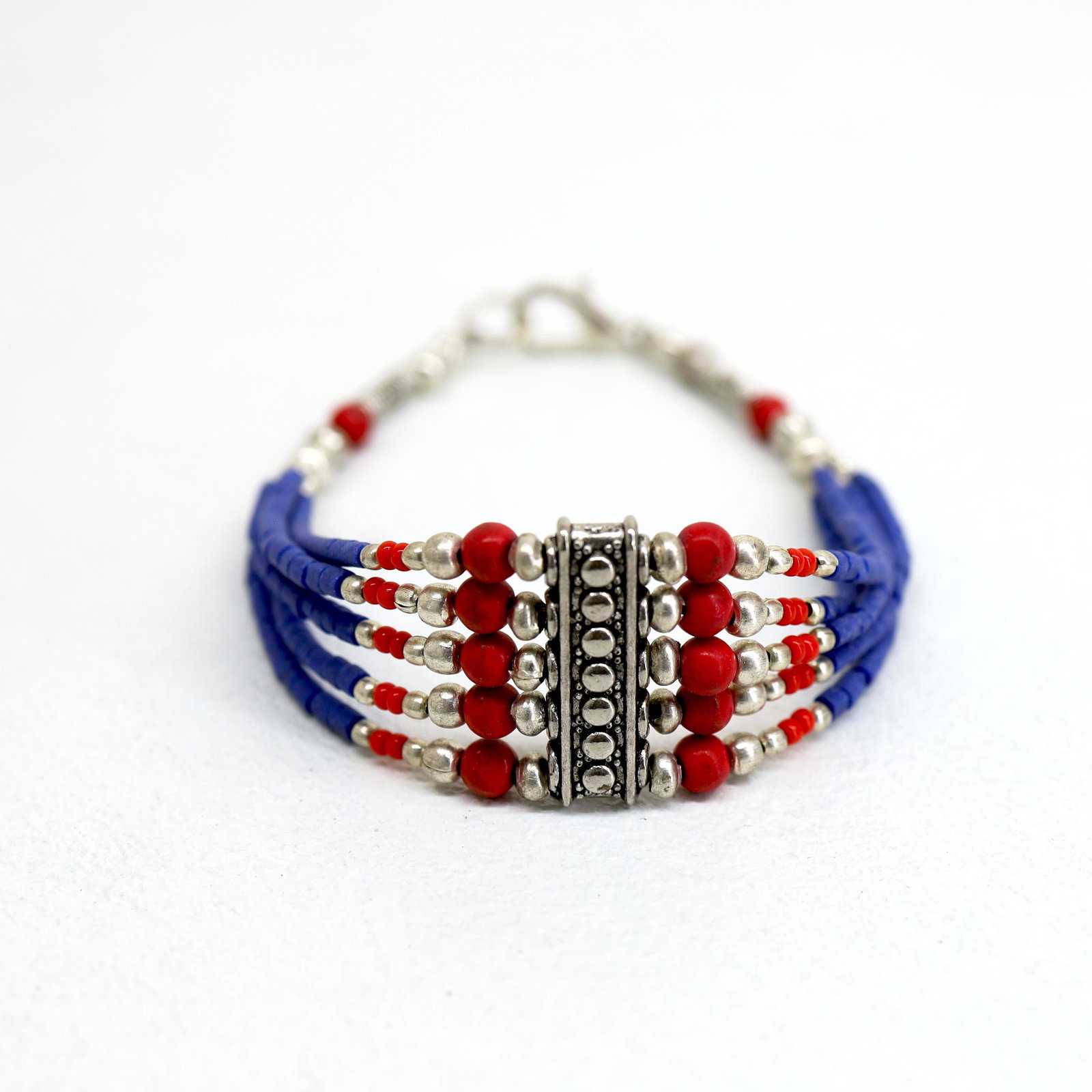 Tibetan Lapis Handmade 5 Line Bracelet: TIBETAN TURQUOISE & CORAL HANDMADE BRACELETWeight: 10 Gram ApproxGemstones: Turquoise & Coral, LapisBrand: HandmadeBracelet Length: 7 to 8 InchCountry/Region of Manufacture: Kathmandu/Nepal