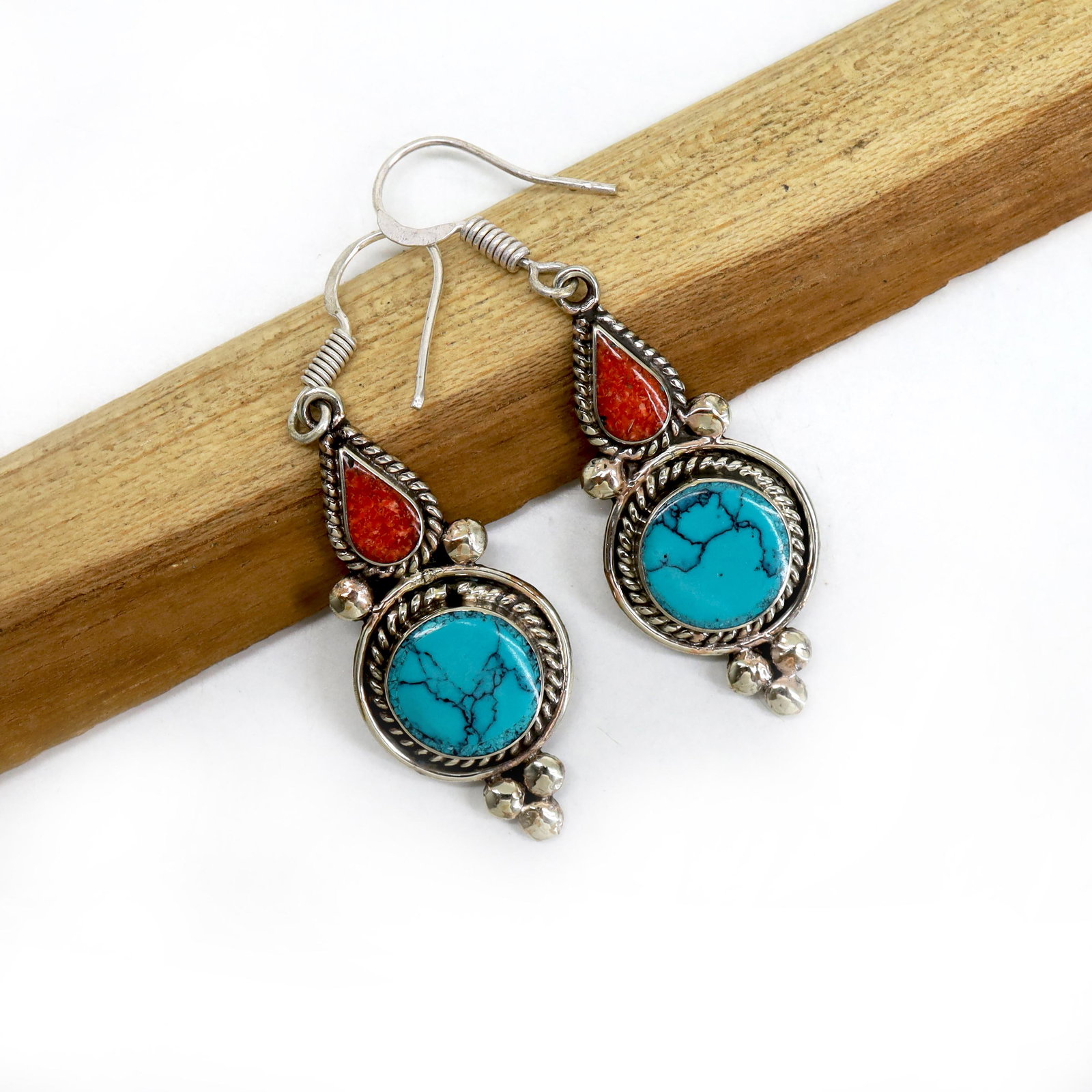 New Arrival - Turquoise & Coral Tibetan Earring: Tibetan Handmade Ethnic EarringsMain Stone: Turquoise, Coral & LapisMetal: Tibetan SilverMaterial: StoneBrand: HandmadeStyle: BohemianEthnic Origin: TibetanCountry/Region of Manufacture: Nepal