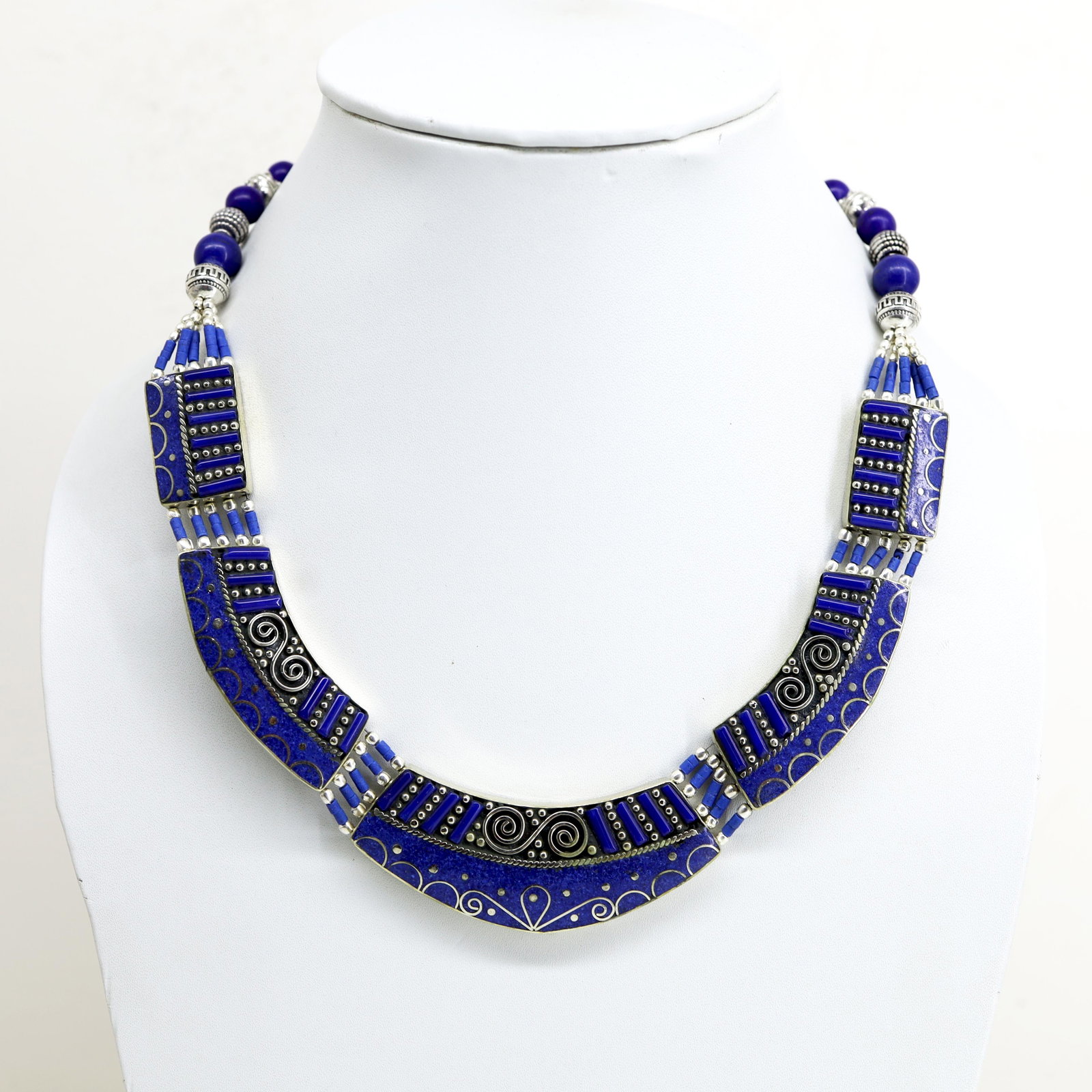 Natural Lapis Handmade Tibetan Choker Necklace: Tibetan Handmade Ethnic NecklaceMain Stone: Turquoise, Coral & LapisMetal: Tibetan SilverSize(Inch): 18Material: StoneBrand: HandmadeStyle: BohemianEthnic Origin: TibetanCountry/Region of Manufacture: