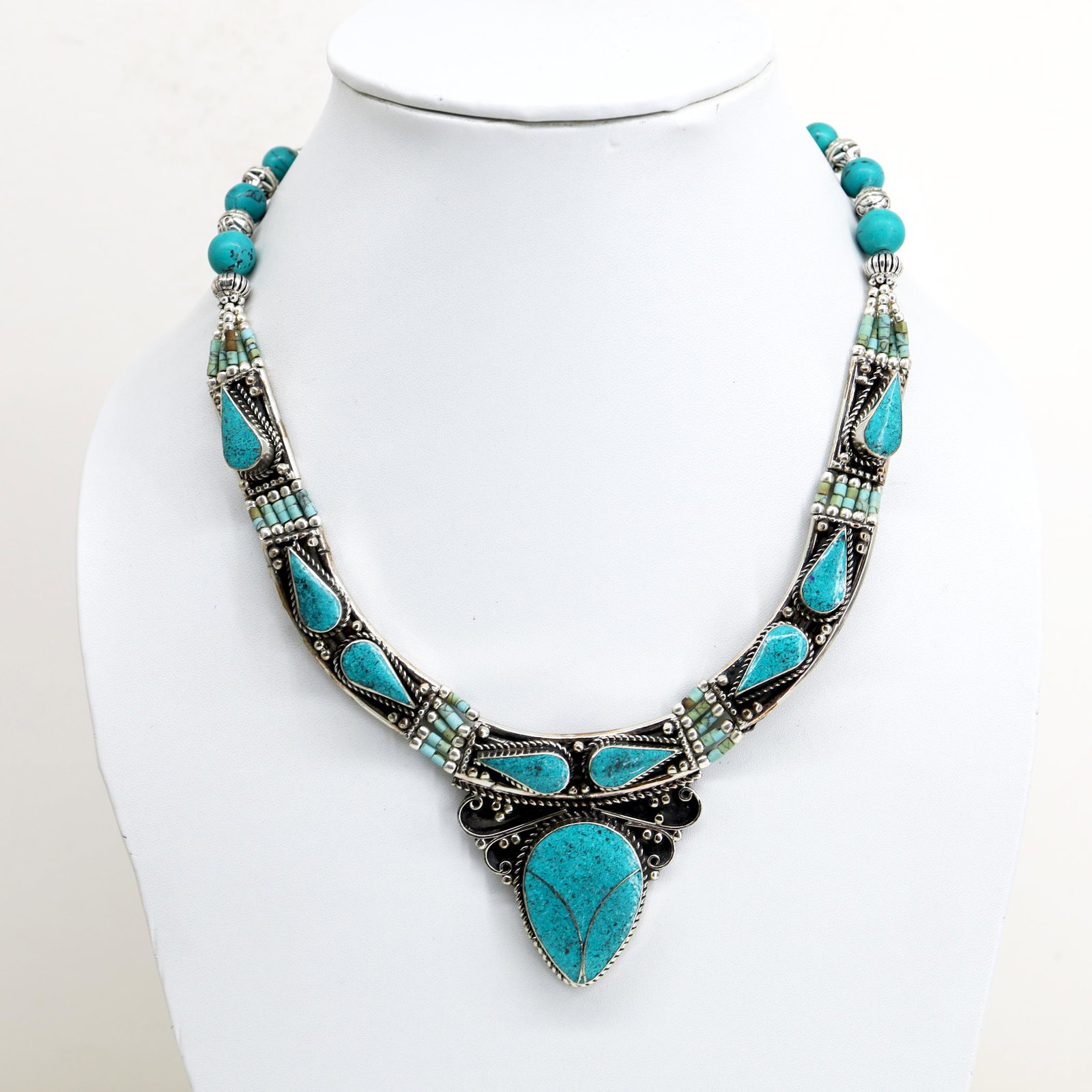 Natural Turquoise Handmade Ethnic Choker Necklace: Tibetan Handmade Ethnic NecklaceMain Stone: Turquoise, Coral & LapisMetal: Tibetan SilverSize(Inch): 18Material: StoneBrand: HandmadeStyle: BohemianEthnic Origin: TibetanCountry/Region of Manufacture: