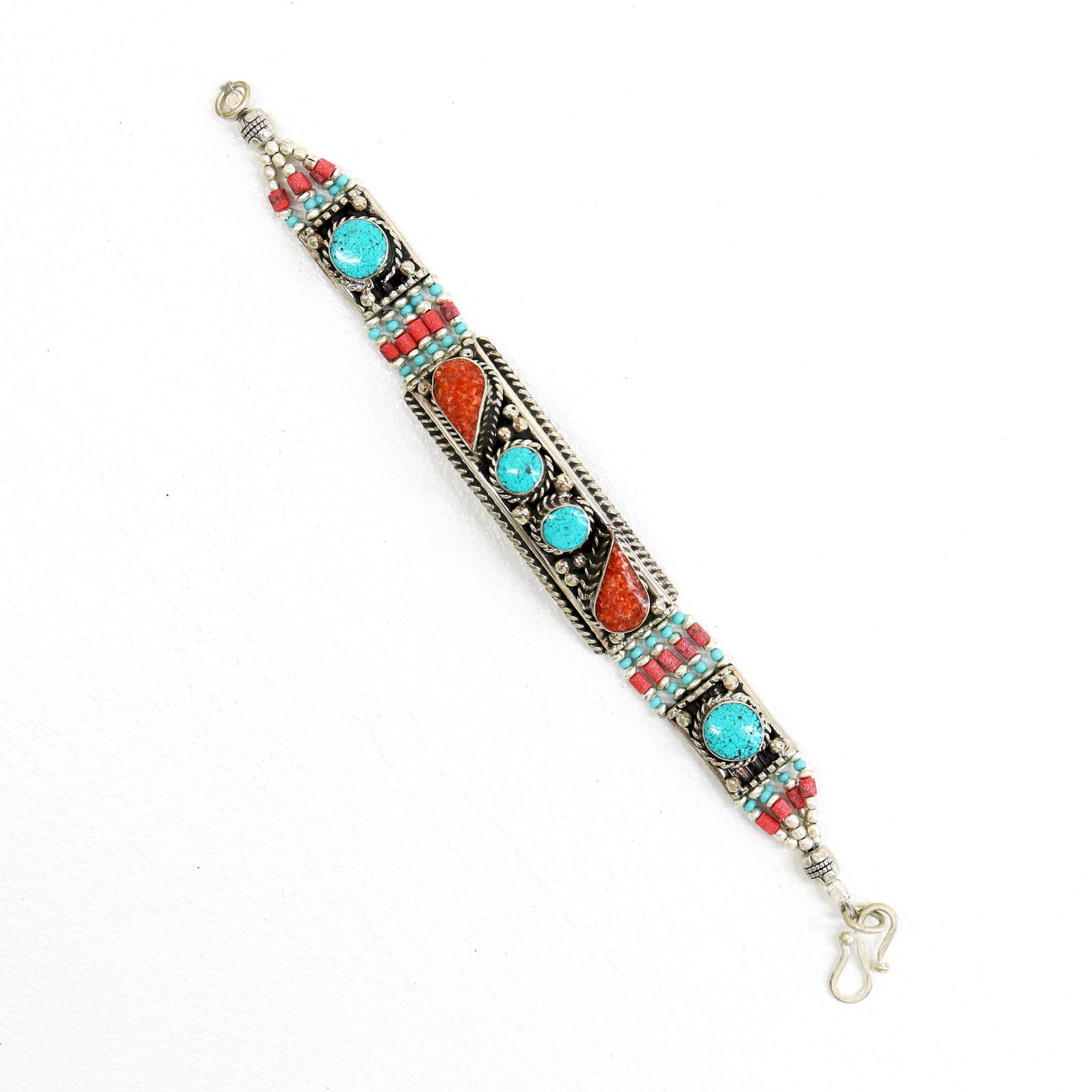 Ethnic Turquoise & Coral Choker Handmade Bracelet: TIBETAN TURQUOISE & CORAL HANDMADE BRACELETWeight: 30 Gram ApproxGemstones: Turquoise & Coral, LapisBrand: HandmadeBracelet Length: 6 to 7 InchCountry/Region of Manufacture: Kathmandu/Nepal