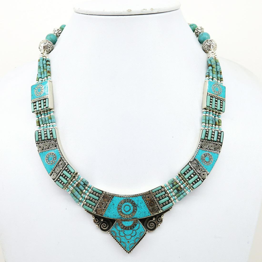 Tibetan Turquoise Handmade Ethnic Necklace: Tibet Natural Stone Hand Made Turquoise, Coral & Lapis Necklace......This elegant Necklace was handcrafted in Tibet, the home of exquisite jewelry craftsmanship. It was skillfully made with large natu