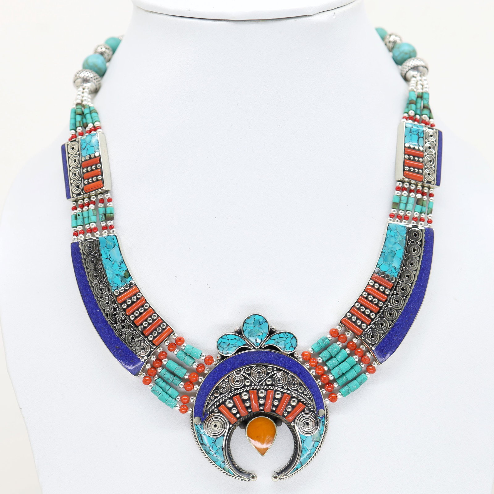 Traditional Turquoise & Lapis Chokar Necklace: Tibetan Handmade Ethnic NecklaceMain Stone: Turquoise, Coral & LapisMetal: Tibetan SilverSize(Inch): 18Material: StoneBrand: HandmadeStyle: BohemianEthnic Origin: TibetanCountry/Region of Manufacture: