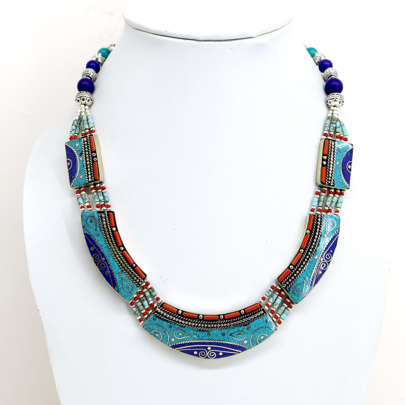 Natural Turquoise & Lapis Handmade Necklace: Tibet Natural Stone Hand Made Turquoise, Coral & Lapis Necklace......This elegant Necklace was handcrafted in Tibet, the home of exquisite jewelry craftsmanship. It was skillfully made with large natu