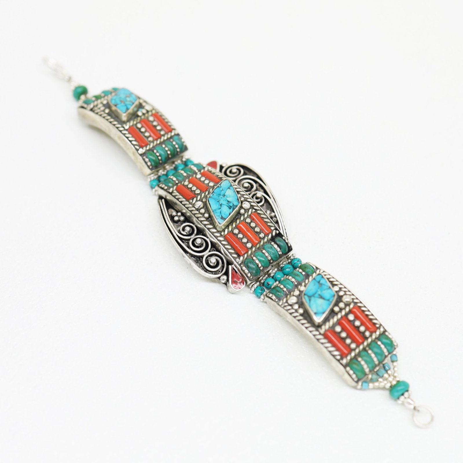 Antique Nepali Tibetan Turquoise & Lapis Bracelet: TIBETAN TURQUOISE & CORAL HANDMADE BRACELETWeight: 30 Gram ApproxGemstones: Turquoise & Coral, LapisBrand: HandmadeBracelet Length: 6 to 7 InchCountry/Region of Manufacture: Kathmandu/Nepal