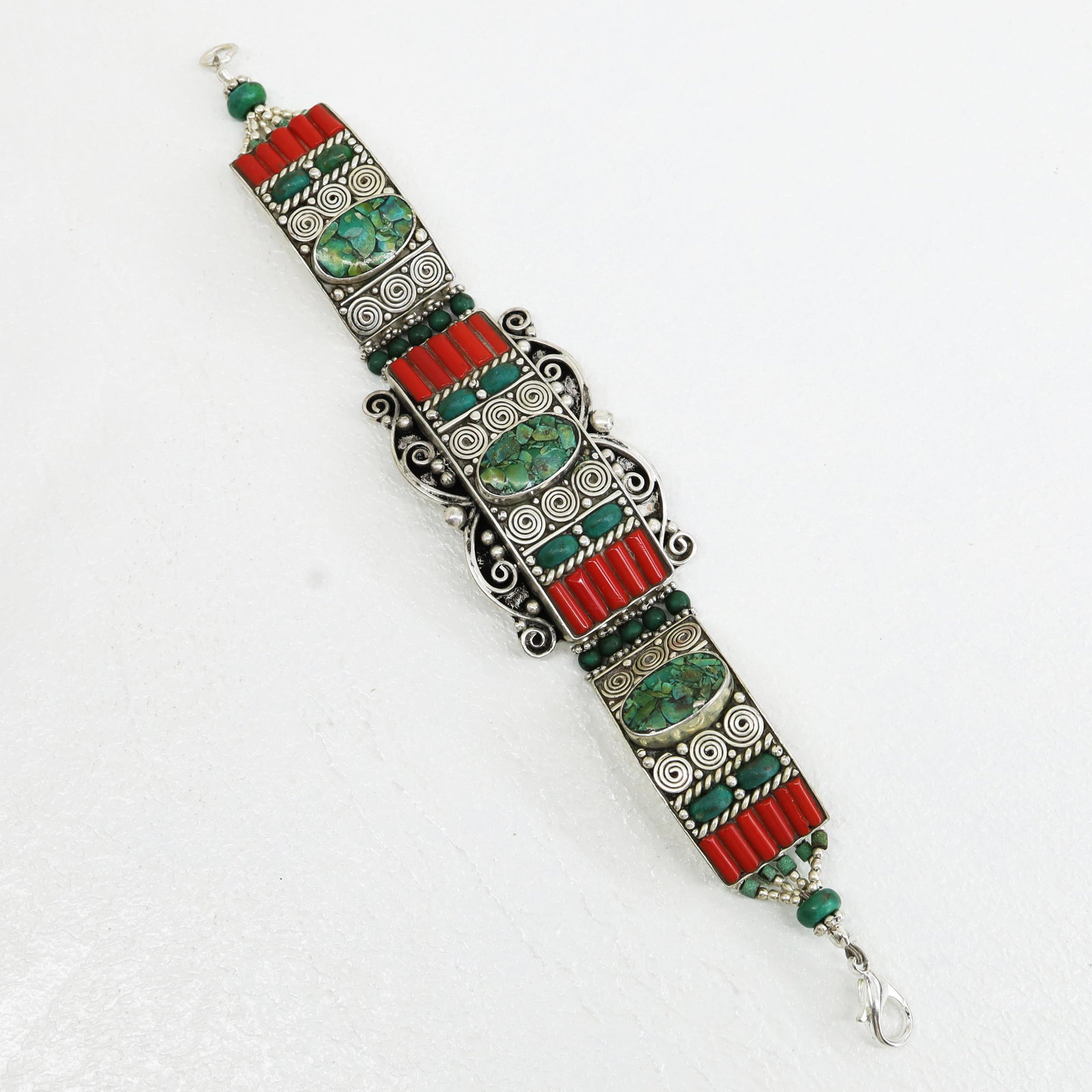 Antique Tibetan Turquoise Ethnic Bracelet: TIBETAN TURQUOISE & CORAL HANDMADE BRACELETWeight: 30 Gram ApproxGemstones: Turquoise & Coral, LapisBrand: HandmadeBracelet Length: 6 to 7 InchCountry/Region of Manufacture: Kathmandu/Nepal