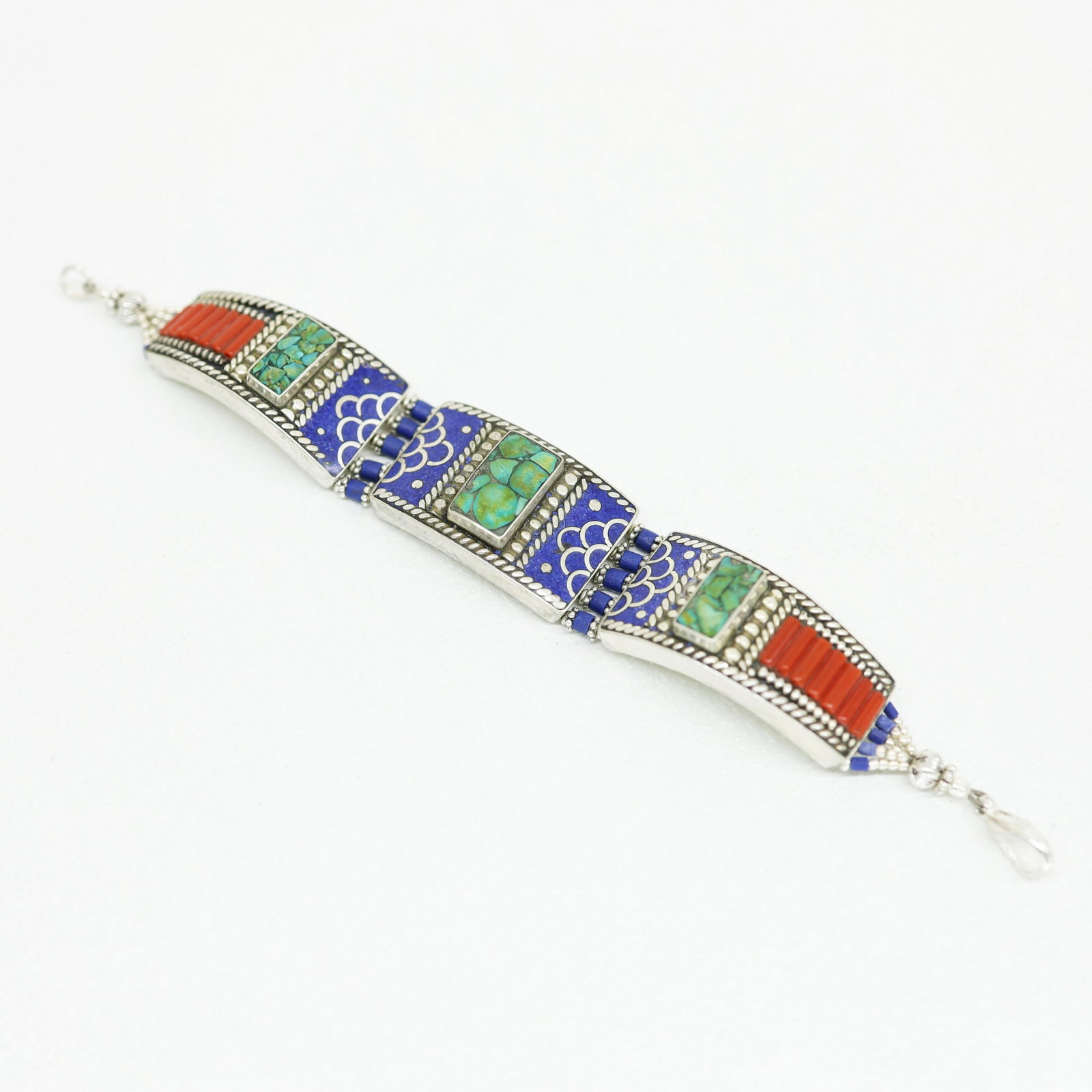 Antique Traditional Vintage Choker Bracelet: Tibetan Handmade Ethnic BraceletMain Stone: Turquoise, Lapis & CoralMetal: Tibetan SilverLength (inches): 6 to 7Weight: 30 Gram ApproxMaterial: StoneBrand: HandmadeStyle: BohemianEthnic Origin: Tibeta