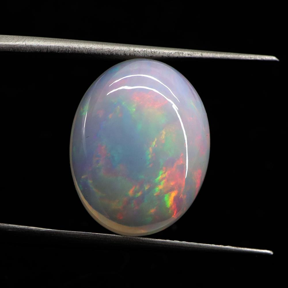 7.88 CTS Natural Ethiopian Opal - 16.2X12.8X6.8 MM (1 of 8)