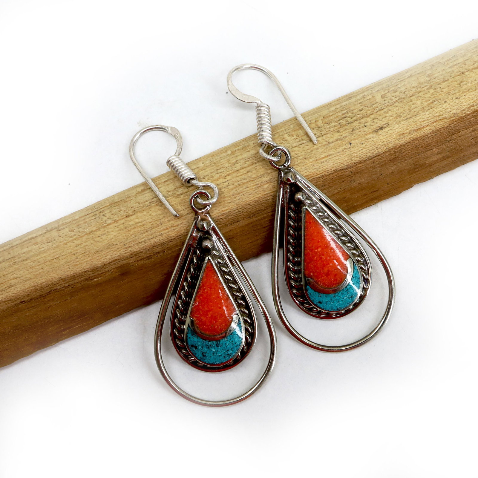 Tibetan Turquoise & Coral Handmade Choker Earrings: Tibetan Handmade Ethnic EarringsMain Stone: Lapis & TurquoiseMetal: Tibetan SilverMaterial: StoneBrand: HandmadeStyle: BohemianEthnic Origin: TibetanCountry/Region of Manufacture: Nepal