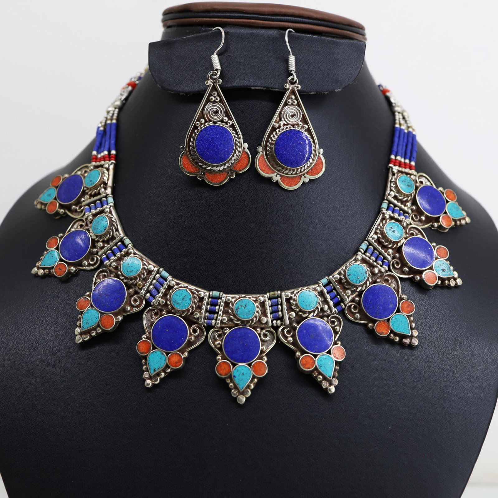 Turquoise & Lapis Handmade Choker Necklace & Earrings: Tibetan Handmade Ethnic Necklace With EarringMain Stone: Turquoise, Coral & LapisMetal: Tibetan SilverSize(Inch): 18Material: StoneBrand: HandmadeStyle: BohemianEthnic Origin: TibetanCountry/Region of