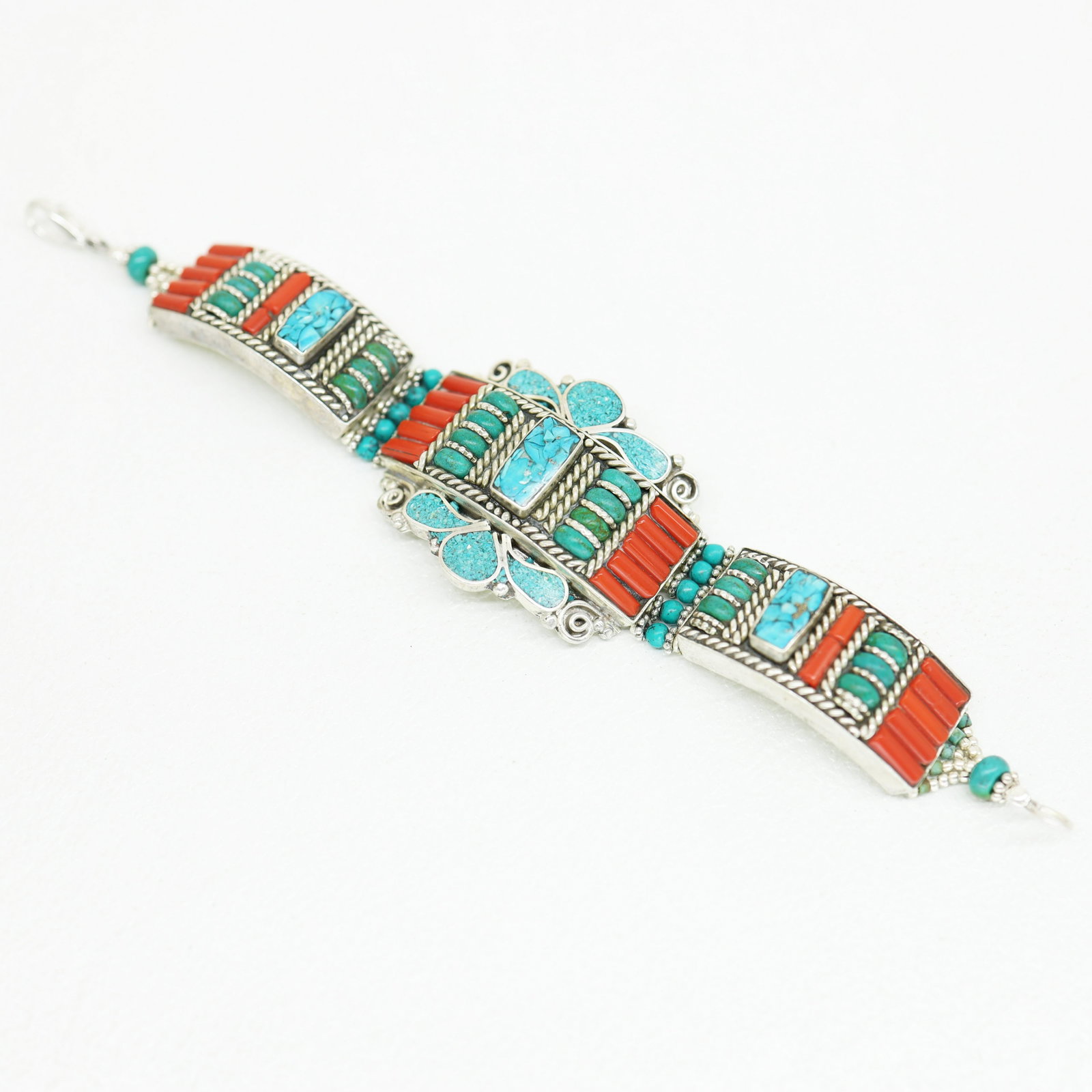 Tibetan Turquoise & Amber Handmade Ethnic Bracelet: TIBETAN TURQUOISE & CORAL HANDMADE BRACELETWeight: 30 Gram ApproxGemstones: Turquoise & Coral, LapisBrand: HandmadeBracelet Length: 6 to 7 InchCountry/Region of Manufacture: Kathmandu/Nepal