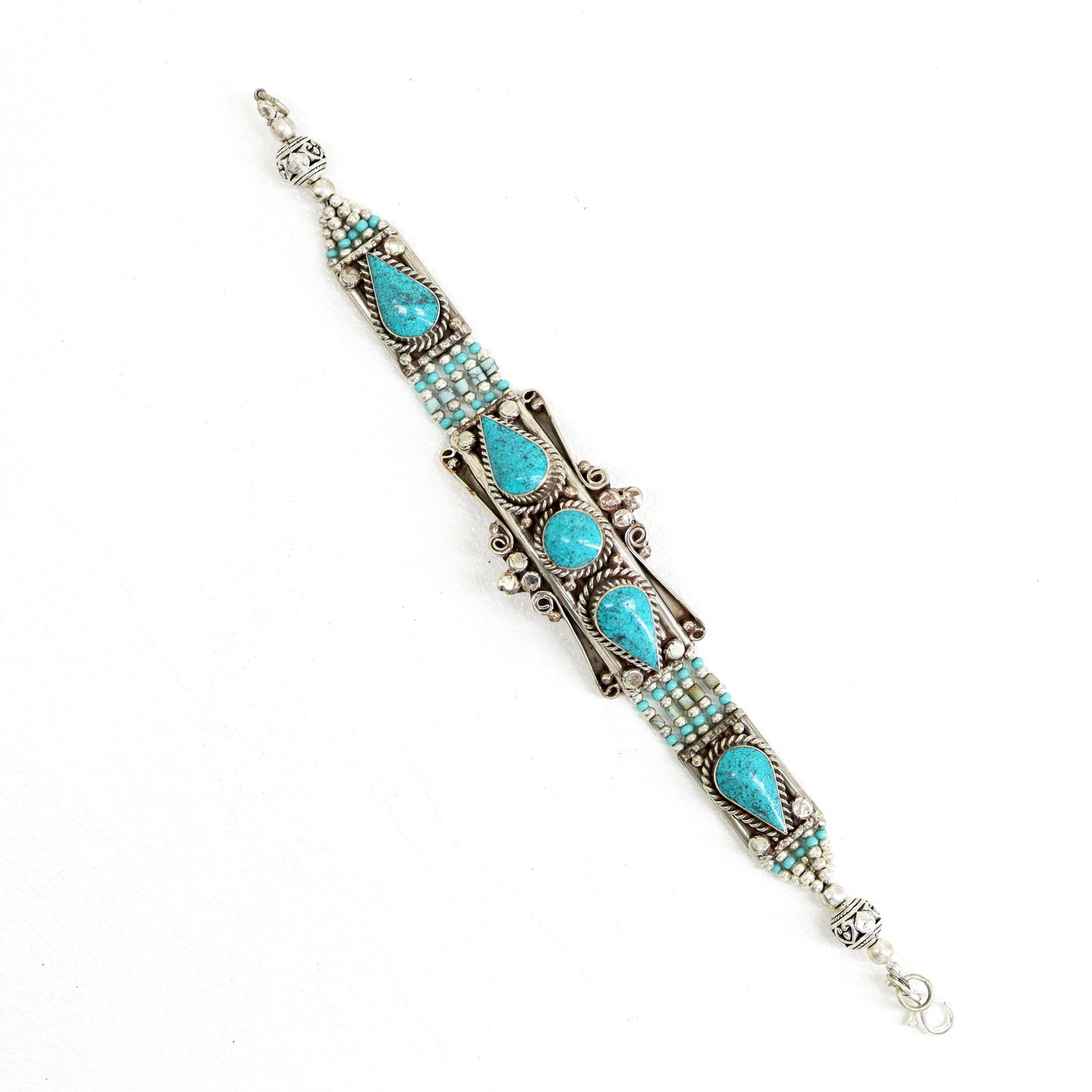 Ethnic Choker Handmade Tibetan Bracelet: TIBETAN TURQUOISE & CORAL HANDMADE BRACELETWeight: 30 Gram ApproxGemstones: Turquoise & Coral, LapisBrand: HandmadeBracelet Length: 6 to 7 InchCountry/Region of Manufacture: Kathmandu/Nepal