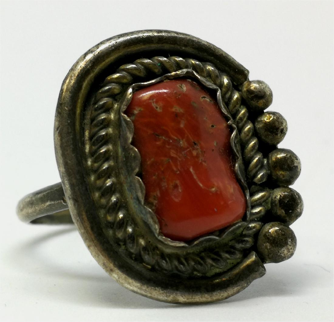 Sterling Silver And Coral Ring: Sterling Silver And Coral Ring, Marked Sterling. 4.2 G. Size 7.