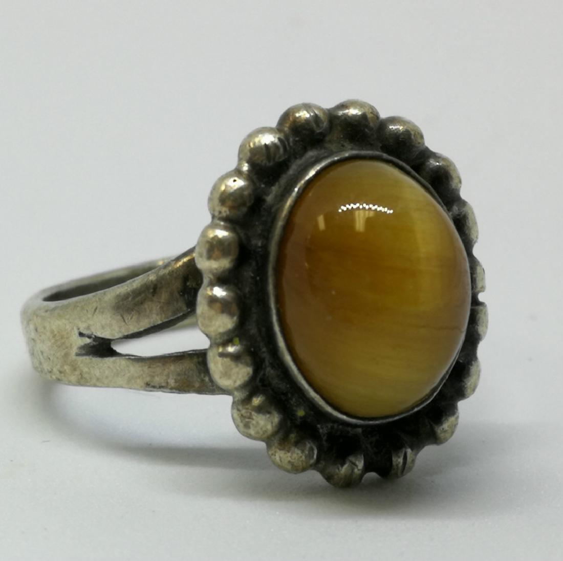 Sterling Silver Ring With Brown Stone: Sterling Silver Ring With Brown Stone, Sterling. 4.2 G. Size 5.