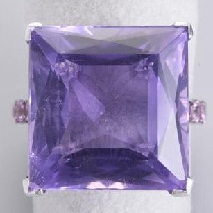 Large Amethyst Ring: This beautiful ring has been made by a master goldsmith, the mounting has been designed and crafted, tailored for this stone. 5.59 grams of White 18 k Gold. The magnificent amethyst is 18.69 carats su