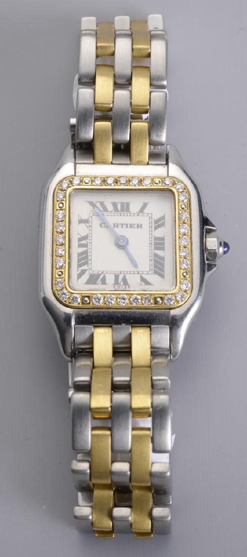 Gold & Diamond Cartier de Panthere Ladies Watch: The face of the watch is surrounded with 32 round fancy diamonds, very beautiful diamonds. The watch needs a new battery. The numbers are Roman Numerals. The watch is stainless steel and gold. Was pre