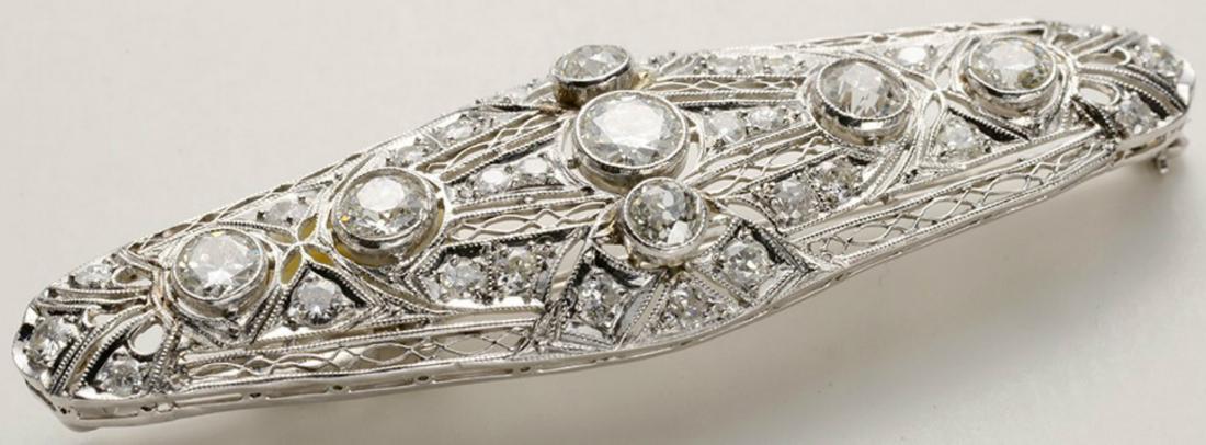 Antique European Platinum Diamond Pin: An Antique Platinum and Diamond Pin that was handcrafted either of Italian or French origin. This European Brooch has been crafted in approximately between the 1920s to the 1940s out of 9.26 grams of 