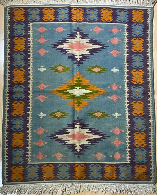 Vintage Hungarian Kilim: This rug is made with premium products aimed to provide maximum softness. Itâ€™s originally from Hungary but in ornaments and motifs still reflect iconic Persian styled. It's hand-knotted with ca