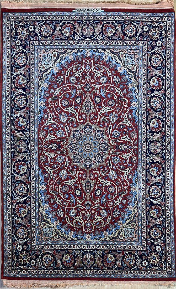 Pair Antique Isfahan Kork and Silk signed: Signed "IRAN. ISFAHAN AHMAD SHAHABPOUR"An Persian Isfahan Carpet that has been hand knotted by master Atelier Ahmad Shebab Pour. The carpet is signed Iran Isfahan Ahmad Shebab Pour. The master atelier