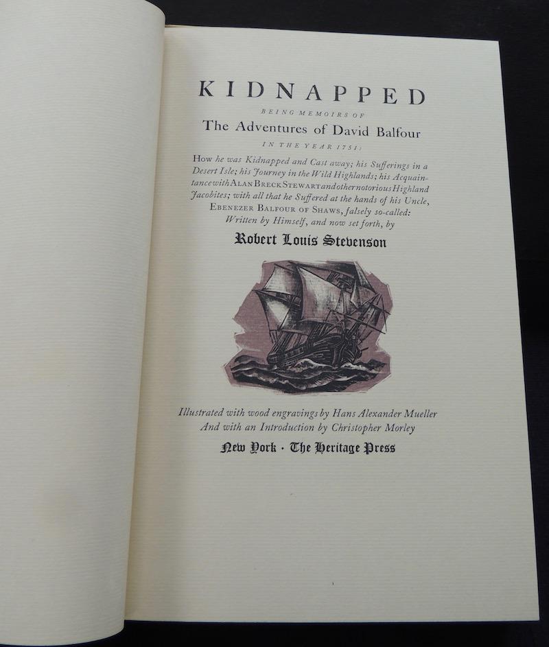 Robert Louis Stebenson - Kidnapped - 1938: Robert Louis Stebenson - Kidnapped - Heritage Press, New York, 1938. Hardcover Blue-grey cloth boards printed with faint images of ships and swashbuckling; red title plate with gilt letters on spine. 