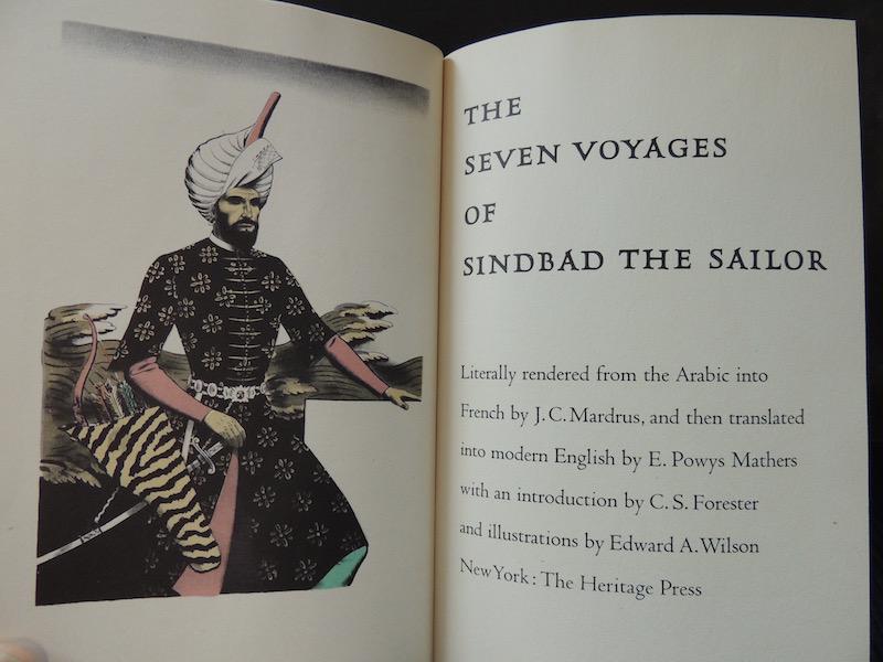 The Seven Voyages of Sinbad the Sailor Book 1949: The Seven Voyages of Sinbad the Sailor Heritage Press, NY, 1949. Hardcover Book, with Illustrations by Edward A. Wilson with Introduction by C. S. Forester. Red cloth with gilt titles and gray paper o