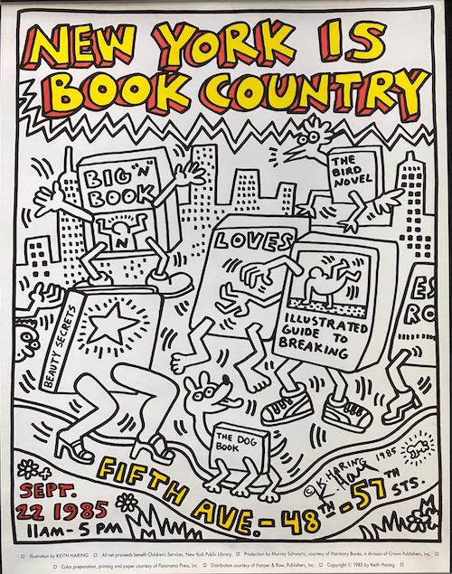 Keith Haring |1985 Poster Signed: Keith Haring | 1985 New York is Book Country Lithograph Poster | Signed K Haring below Printed Name | Measures 19 3/4 x 25 1/2 | Please Note: No COA - Certificate of Authenticity