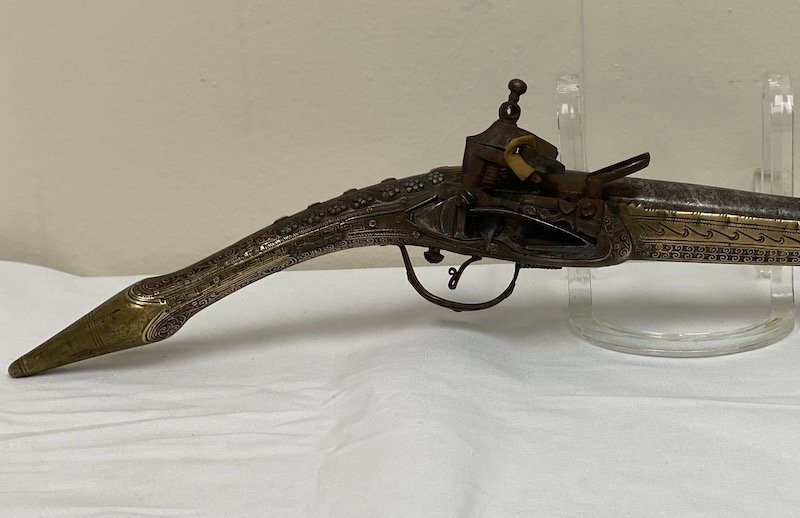 Ottoman Islamic Turkish / Greece Flintlock Pistol: Islamic Turkish Ottoman Greece 19th Century Flintlock Pistol | Silver and Brass Gilt | The surface profusely chased dense floral sprays with narrow tapering grip| Measures 21" 1/8 Long