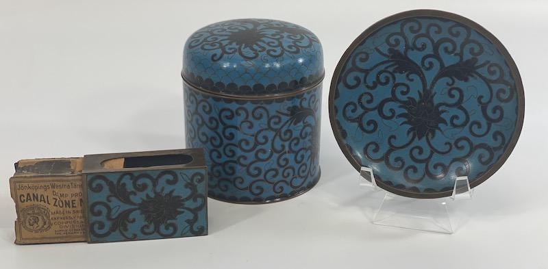 1930's Chinese Blue & Black Cloisonne Cigarette Set of: Chinese Blue & Black Cloisonne Cigarette Set of 3 Floral Design | Cigarette Casister - Match Box Holder (Panama Canal Zone Match Box) & Ashtray Canister measures 3 1/8 round & 3 3/8 High | Plate measu