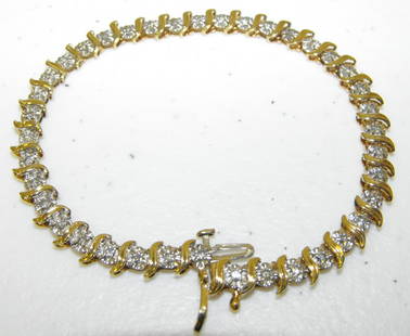 14K Gold & Diamond Tennis Bracelet: 14K Gold & Diamond(Tested) Tennis Bracelet. 7 1/4" Long. Estate Fresh. Age Appropriate Wear, Please see photos for a better idea of condition.