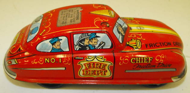 Tin Friction Fire Chief Toy Car: Tin Friction Fire Chief Toy Car. 6 1/2" long by 2 1/2" wide. Working Condition. Age Appropriate Wear, Please see photos for a better idea of condition.