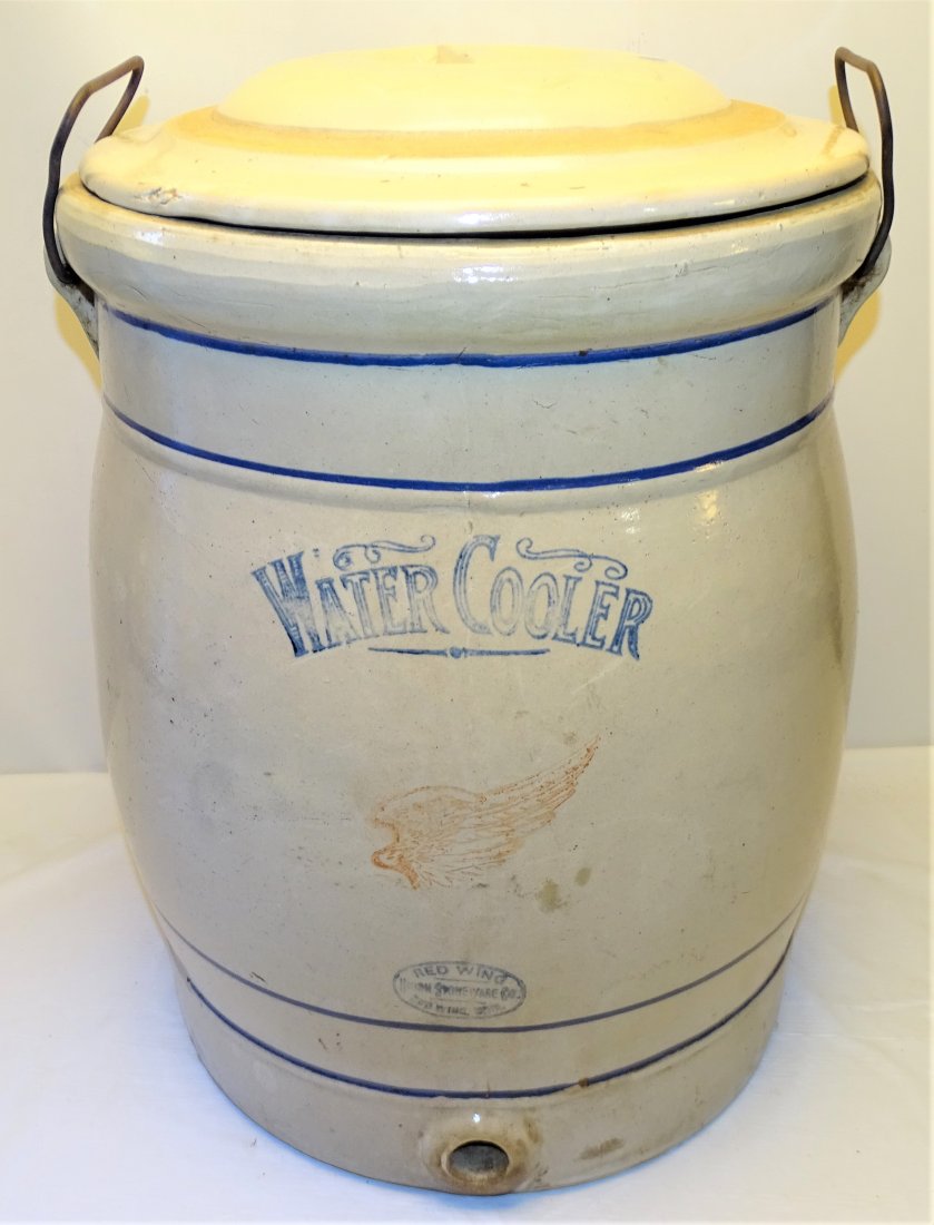 Red Wing Stoneware 10 Gallon Water Cooler Crock: Red Wing 10 gallon stoneware water cooler. Measuring 19 1/4" tall overall and 15" dia. Good condition overall with a couple of tight spiders as can be seen in the photos.