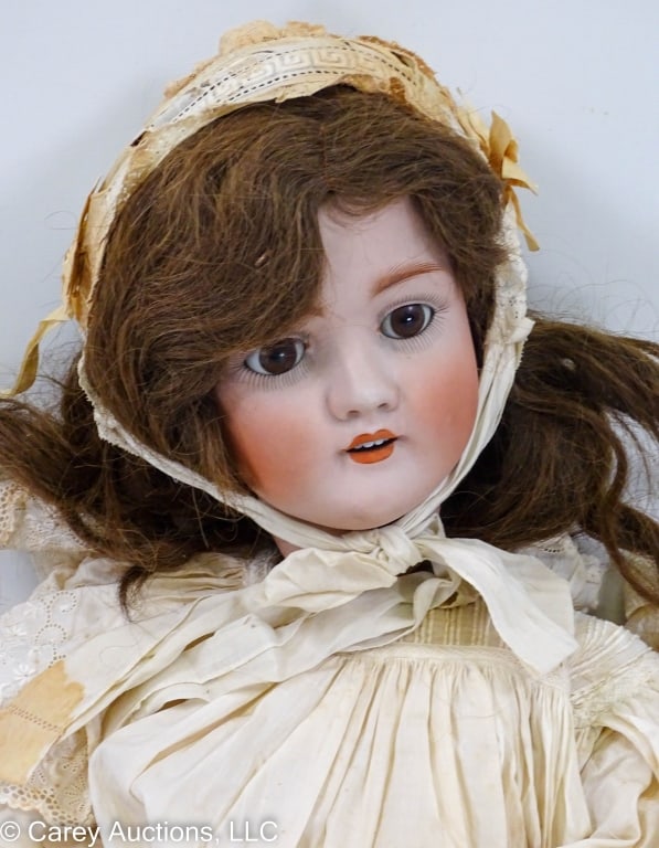 28" KH WALKURE GERMAN DOLL: Circa early 1900's / Kley & Hahn doll by Kestner Walkure; bisque head and jointed body, brown sleepy glass eyes, open mouth and top teeth / Back of head is marked [WALKURE GERMANY 76] / Measures: 28" 