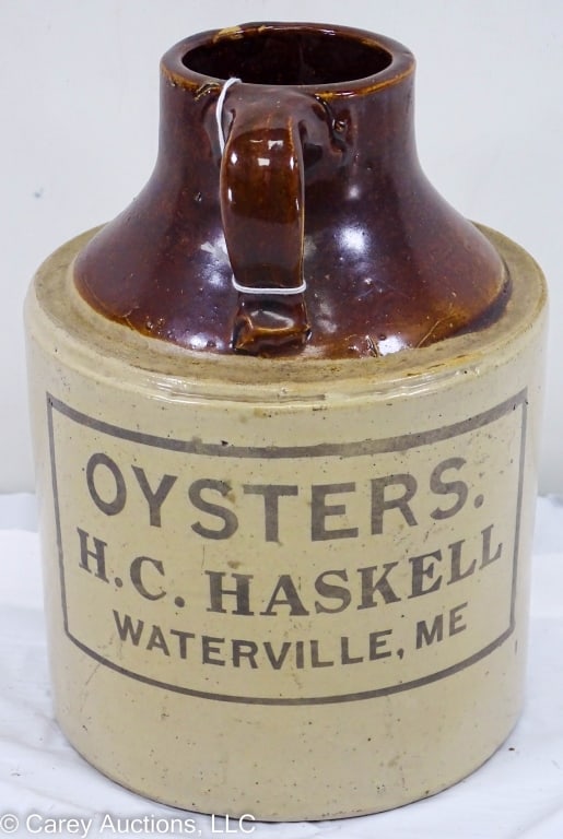 H C HASKELL WATERVILLE MAINE STONEWARE OYSTER JAR: A brown and white glazed stoneware oyster jar marked (Oysters H.C. Haskell Waterville, ME) / Measures: 8" x 6" / Condition: No damage