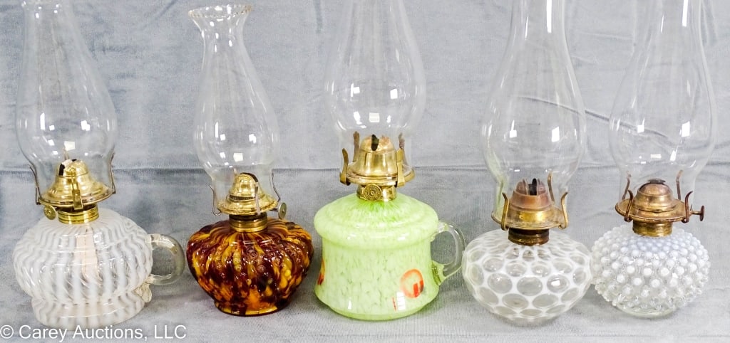 5 OPALESCENT ART GLASS OIL FINGER LAMPS & FONTS: 5 Antique finger lamps and lamp font. (1) finger lamp and (2) lamp fonts have opalescent glass decorations. The large green art glass finger lamp has an art deco look. (1) glass font looks like a tort