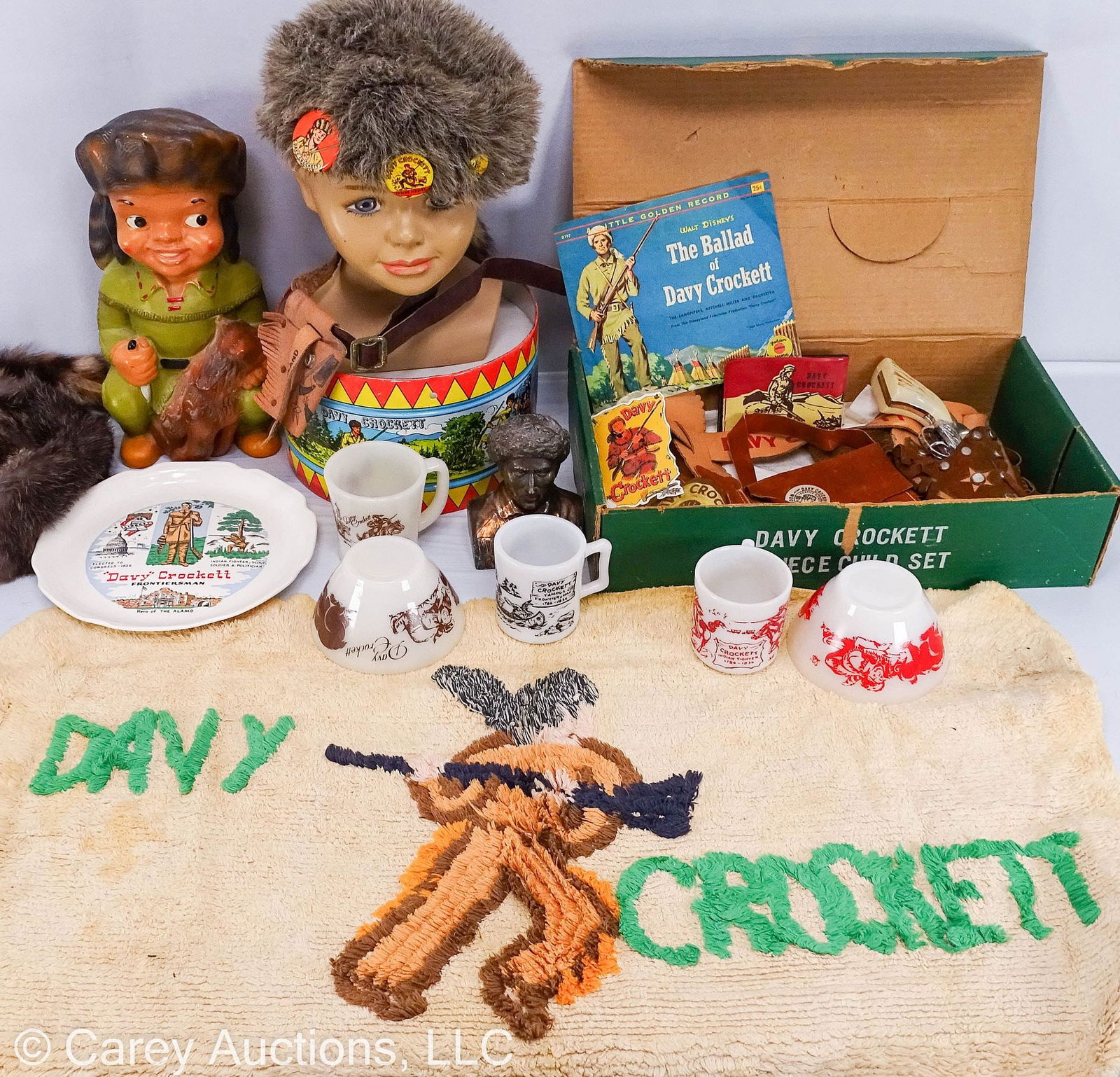 25 DAVY CROCKETT COLLECTIBLES: Includes: Yellow vinyl Little Golden Record Walt Disney 45 record in original sleeve; 9” diam tin litho drum; (2) Fire King bowls, red & brown graphics 3”H x 4.75” diam; Fire Kin