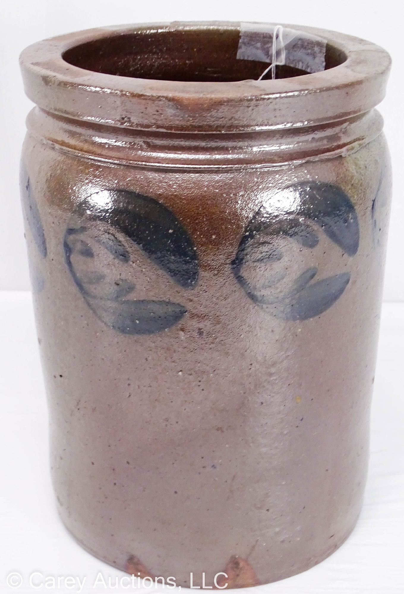 1 GALLON BLACK SOMERSET COUNTY PA STONEWARE CROCK: Six fancy tulip heads circle the top portion of this jar made by the Black family of potters in Confluence or Somerfield, Somerset County Pa. circa 1850-60. Impressed "1" below tooled should