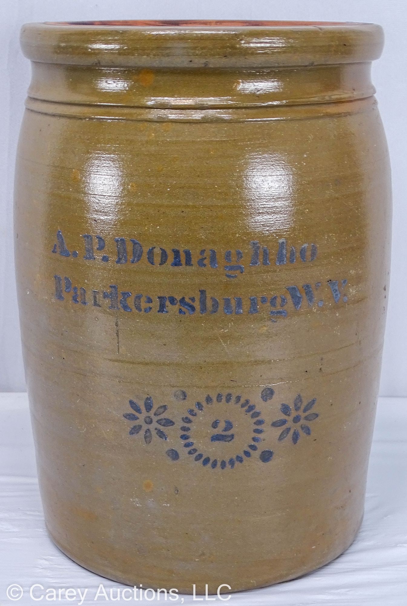 2 GALLON AP DONAGHHO PARKERSBURG WVA STONEWARE CROCK: Stoneware crock with stencil name and decoration. Made by A.P. Donaghho, Parkersburg, W. Va., circa 1880. Tooled collar. // Measureme