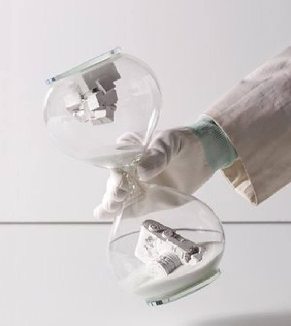 Hour Glass Relic - Daniel Arsham: 2018 Glass, sand and two cast objects Numbered by Arsham; Edition of 500 24.4 x 11.4 cm/ 9.6" x 4.5" Mint Condition; With Original Packaging Location: Hong Kong